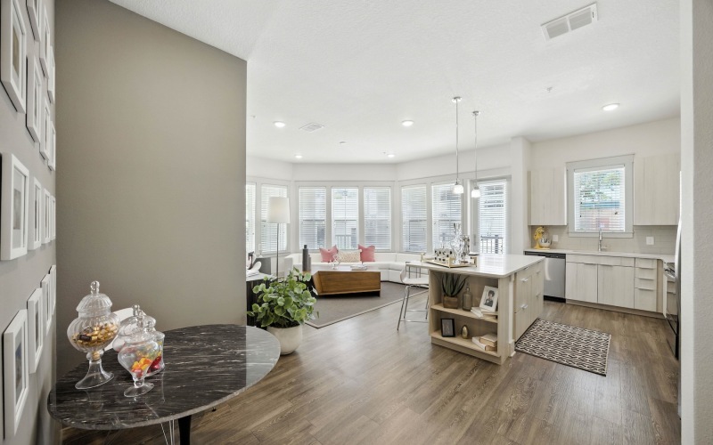 large open layout with living room and kitchen