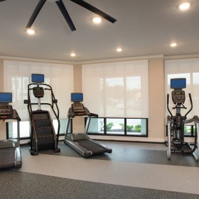 State-of-the-art fitness center large ceiling fans and recessed lighting throughout State-of-the-art fitness center