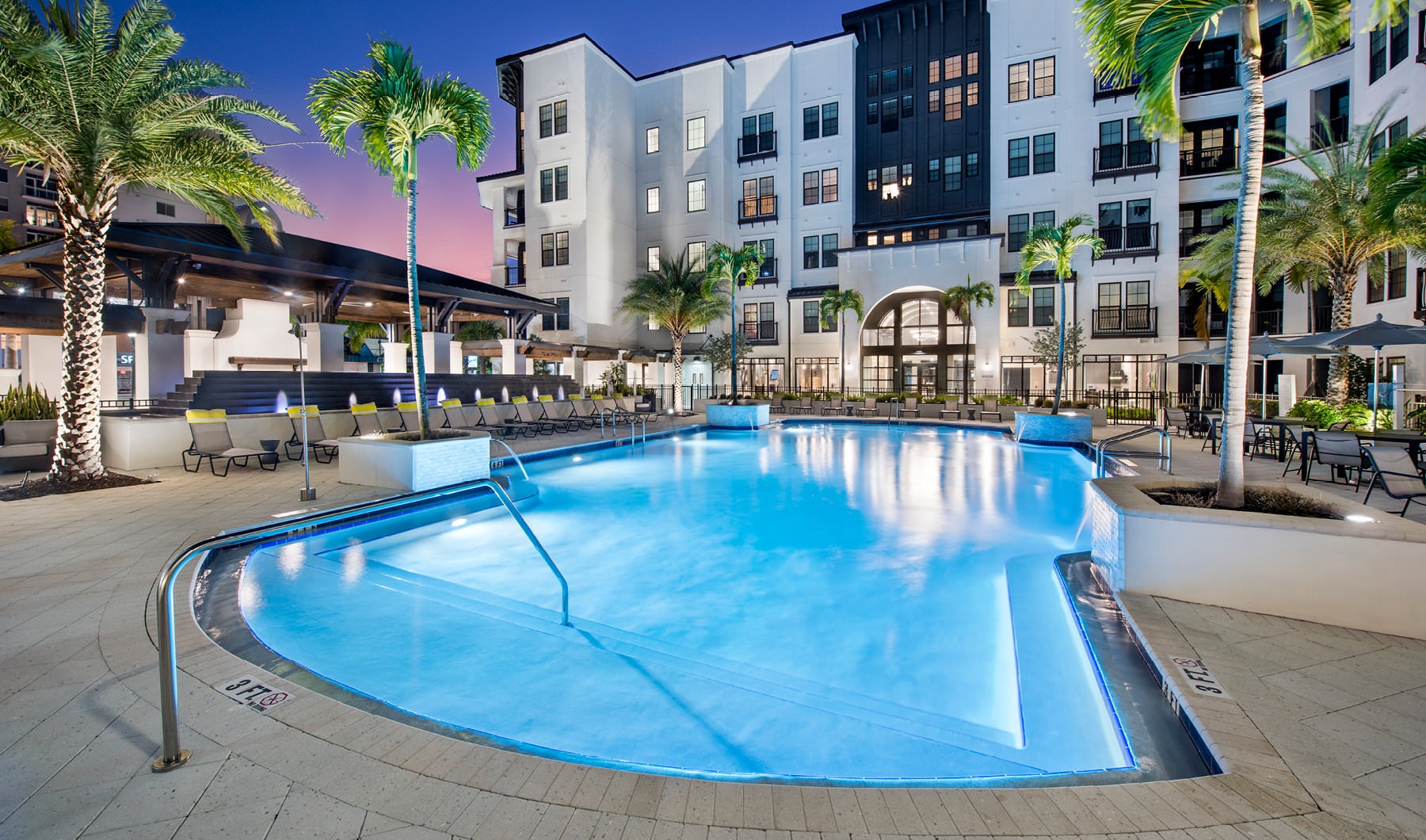 Living Begins Here open, well lit designer kitchens w/quartz countertops